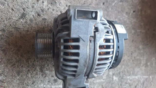 124515142 RE558695 - Alternador Bosch
